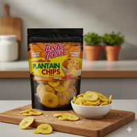 Packaging of Tasty Treat plantain chips with a bowl of chips on a wooden board.